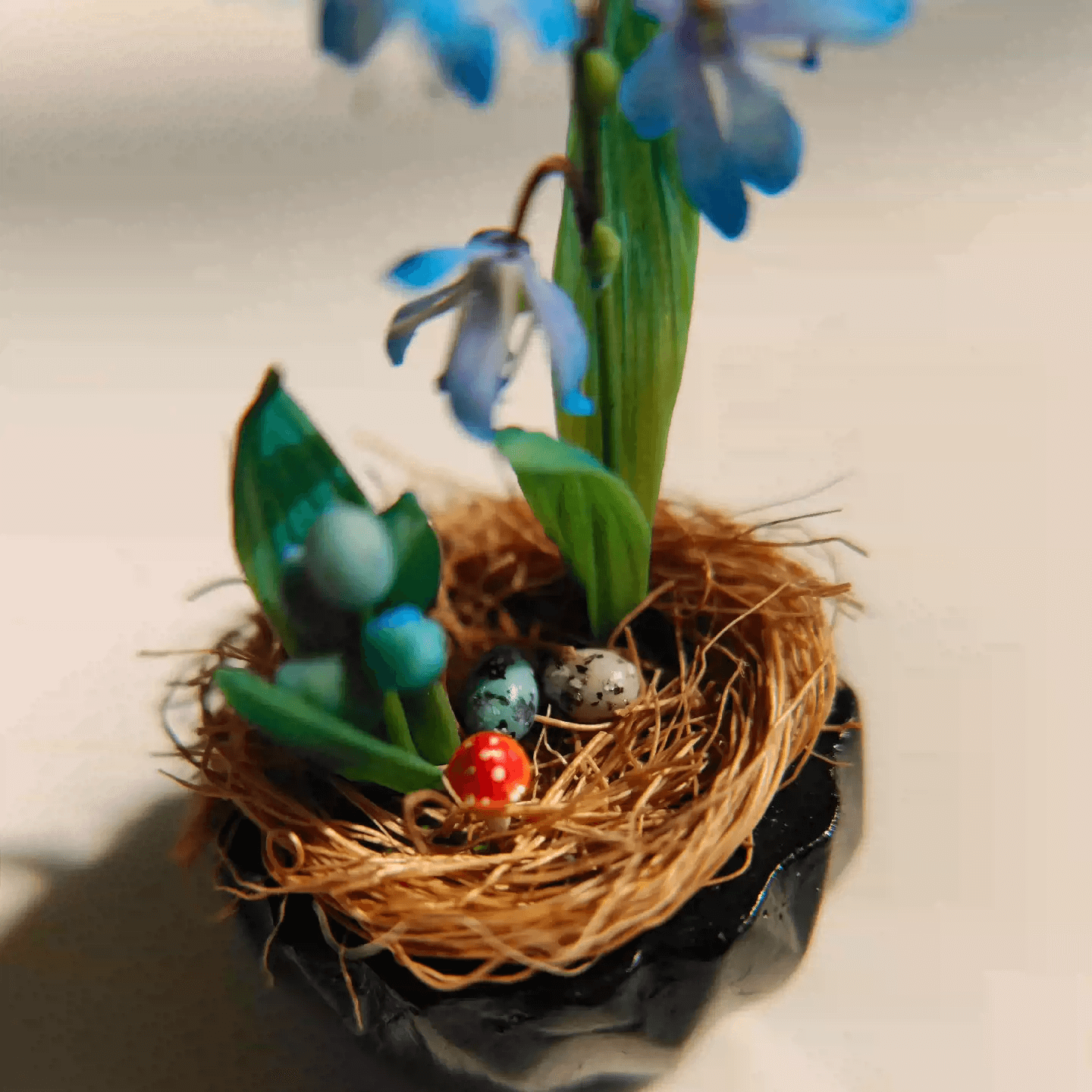 Siberian Squill (Scilla siberica) produces multiple flowers per stem, in the most beautiful deep blue color. Mushroom, Bird's eggs and Siberian Squill (Scilla siberica) in Gypsum pot.  Material: Handmade from Clay