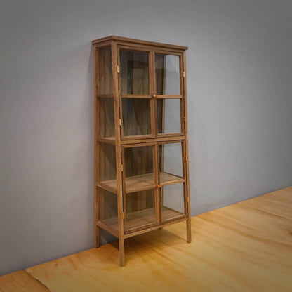 Created with versatility in mind, this display shelf and bookcase may be used in the dollhouse kitchen as a cabinet, in the study as a bookcase or in the living room as a bookcase or display cabinet. Color/ Finish: Cherry wood or Dark walnut