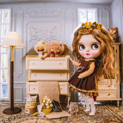 It boasts three spacious drawers, providing ample storage for your essentials. Supported by graceful cabriole legs, this dollhouse chest of drawers combines classic French design with functional elegance, making it a perfect addition to any dollhouse bedroom or living area seeking a touch of refined style and historical charm.