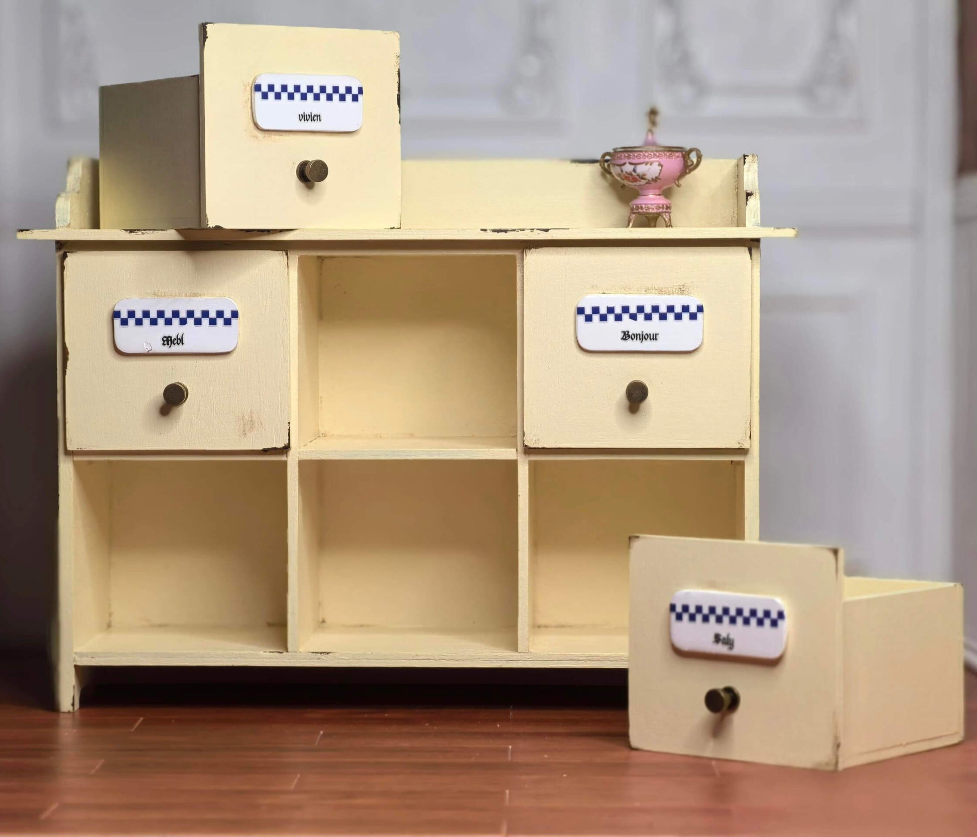 A versatile piece that could be used in any dollhouse, as a spice cupboard in the dollhouse kitchen or as a crafters storage, in bedroom, hall. Default Color/ Finish: Yellow Styles: Vintage Material: Solid Wood Type: Spice Cabinet Scale: 1/6 (20.2×7.3×15.3cm / 7.95×2.87×6.02in)