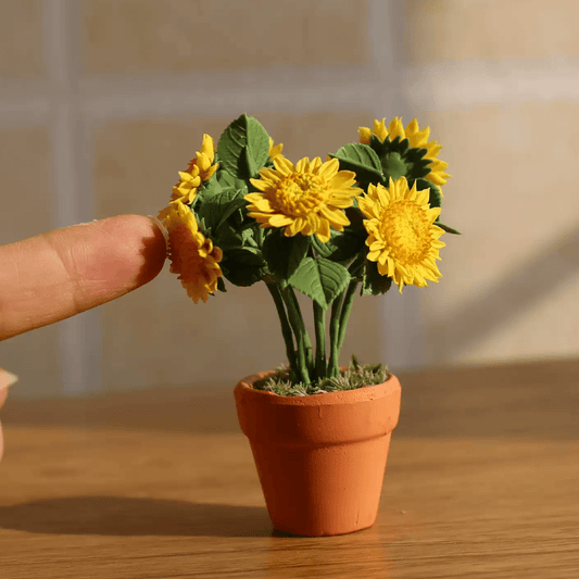Helianthus annuus is a dwarf growing annual sunflower with large, double golden-yellow flowers, it's an excellent cut flower.  Material: Handmade from Clay