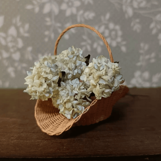 Hydrangeas are deciduous shrubs with flowers in terminal, round or umbrella-shaped clusters in colors of white, pink, or blue, or even purple.  Scale: 1:6; 1:12  Material: Handmade from Clay  Size: Standard; On picture frame.