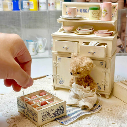 Add a charming touch to your dollhouse kitchen with the Miniature Egg Crate Holder Storage Carrier with Eggs Kit. This delightful kit includes everything you need to create a realistic miniature egg crate, complete with tiny, life-like eggs, perfect for enhancing your kitchen scene or display.