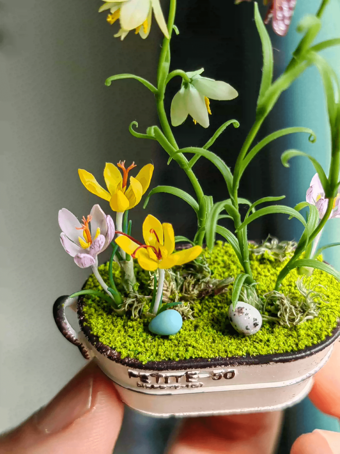 Fritillarias flower from mid to late spring and are perennial.  Crocus is a wonderful bulb to plant underneath trees or in a landscape bed.  Fritillaria thunbergii, Fritillaria meleagris, Crocus sativus and bird's eggs in clay planter.  Material: Handmade from Clay