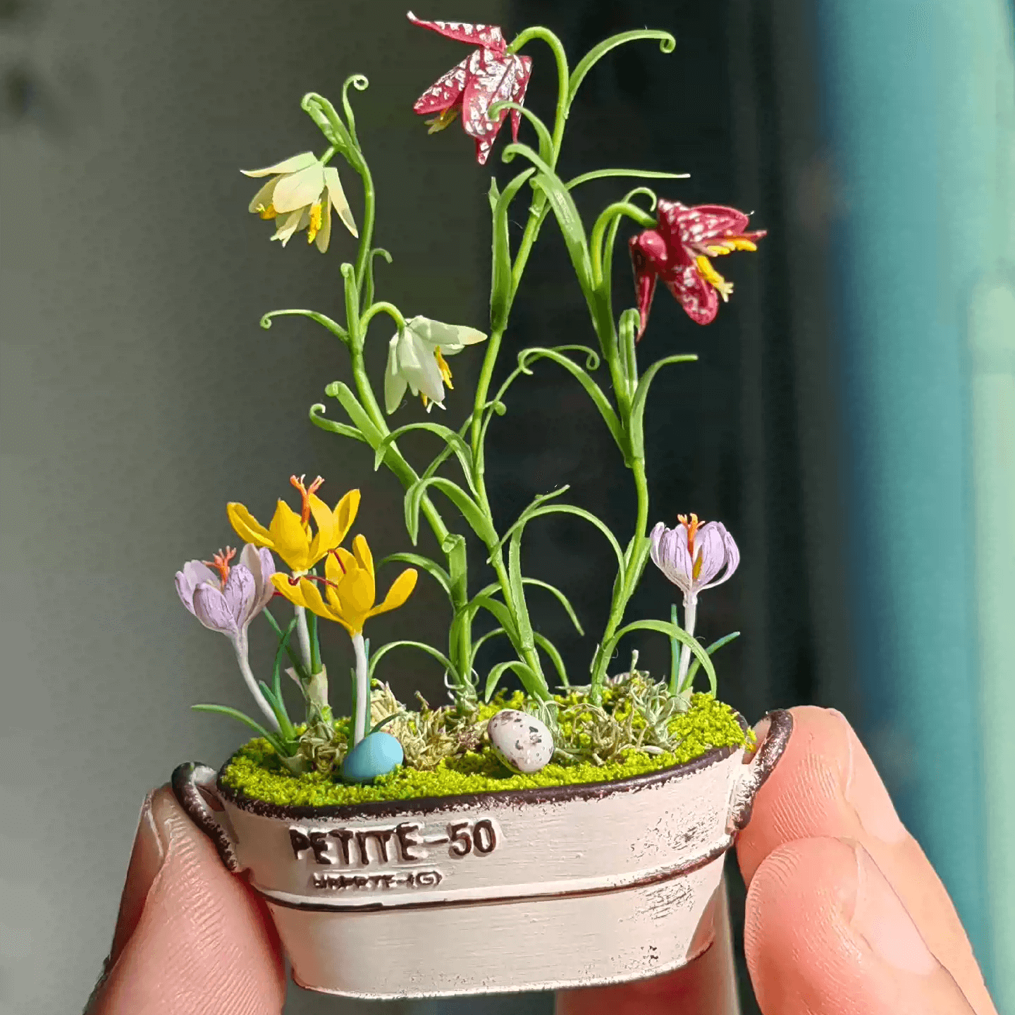 Fritillarias flower from mid to late spring and are perennial.  Crocus is a wonderful bulb to plant underneath trees or in a landscape bed.  Fritillaria thunbergii, Fritillaria meleagris, Crocus sativus and bird's eggs in clay planter.  Material: Handmade from Clay