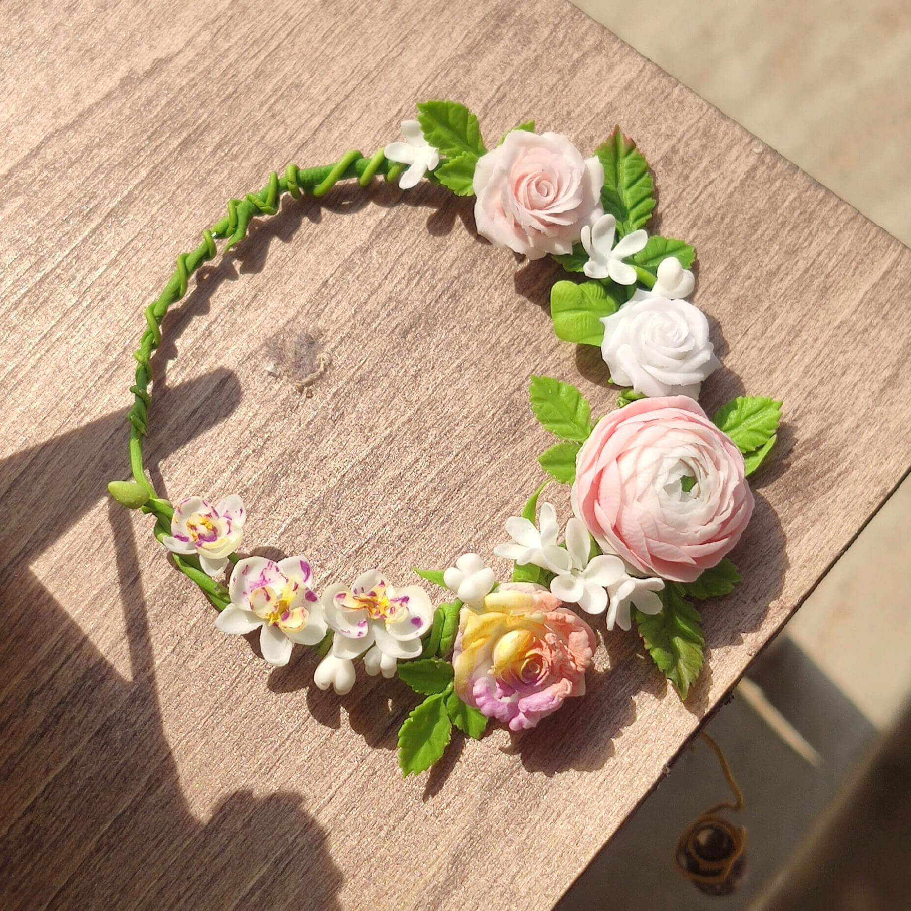 Glamorous accessory designed to elevate Blythe, Barbie, Paola,and other dolls with effortless elegance. Crafted to adorn your dolls with cascading garlands of intricate floral details, this headband adds a touch of enchantment to any dollhouse. Material: Handmade from Clay