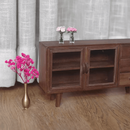 This Miniature Modern Wood Buffet Sideboard Cabinet with Doors and Drawers is ideal for storing dollhouse dinnerware and other items. Made of Black Walnut wood or Cherry wood, it offers a sophisticated and durable storage solution. The doors adds a touch of elegance and allows for a glimpse of the contents inside.