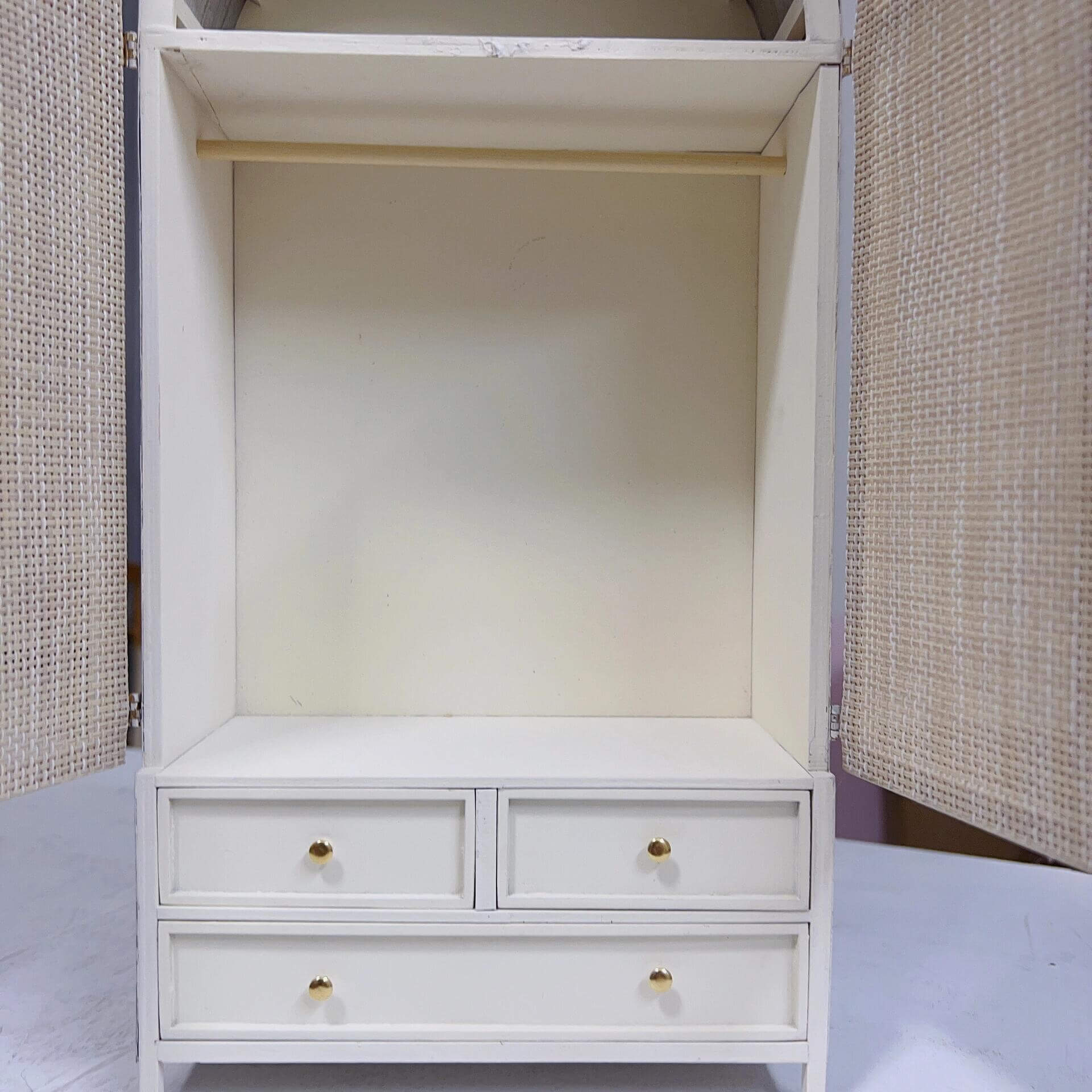 Large, roomy and very beautiful wardrobe. This wardrobe will easily fit all your doll's outfits. 2 doors and 4 drawers can be opened. Color/ Finish: White / Yellow Popular Styles: Modern Material: Wood Type: Wardrobe Armoire Scale: 1/12; 1/6; 1/4 Miniature Furniture for all dollhouse.