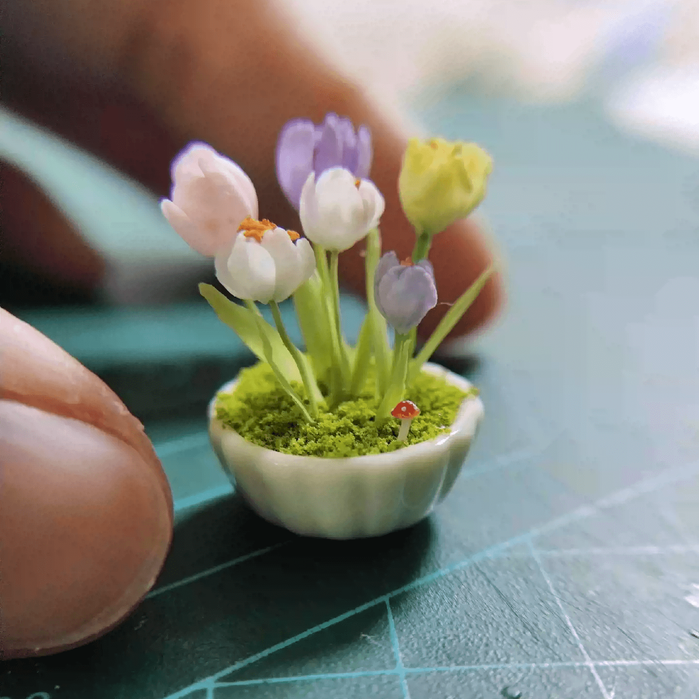 Tulips are erect flowers with long, broad, parallel-veined leaves and a cup-shaped, single or double flower at the tip of the stem.  Material: Handmade from Clay