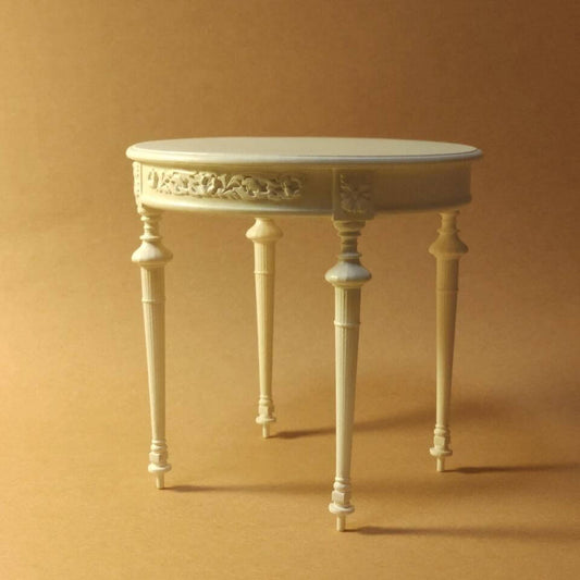 This Miniature Shabby Chic Vintage Round Table Kit is a charming addition to any dollhouse, featuring a beautifully carved tabletop and elegant shabby chic design. Perfect for creating a cozy dining area, a stylish tea corner, or an elegant side table in living rooms or bedrooms, this round table brings timeless character and delicate craftsmanship to your miniature world. Ideal for dollhouse enthusiasts, collectors, and crafters who appreciate vintage-inspired designs and intricate details.