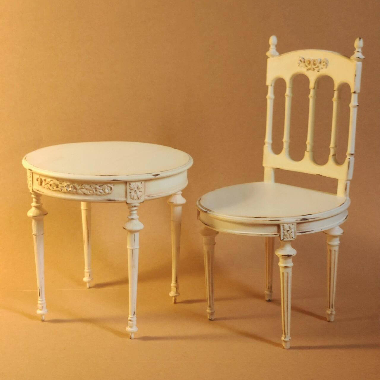 This Miniature Shabby Chic Vintage Round Table Kit is a charming addition to any dollhouse, featuring a beautifully carved tabletop and elegant shabby chic design. Perfect for creating a cozy dining area, a stylish tea corner, or an elegant side table in living rooms or bedrooms, this round table brings timeless character and delicate craftsmanship to your miniature world. Ideal for dollhouse enthusiasts, collectors, and crafters who appreciate vintage-inspired designs and intricate details.