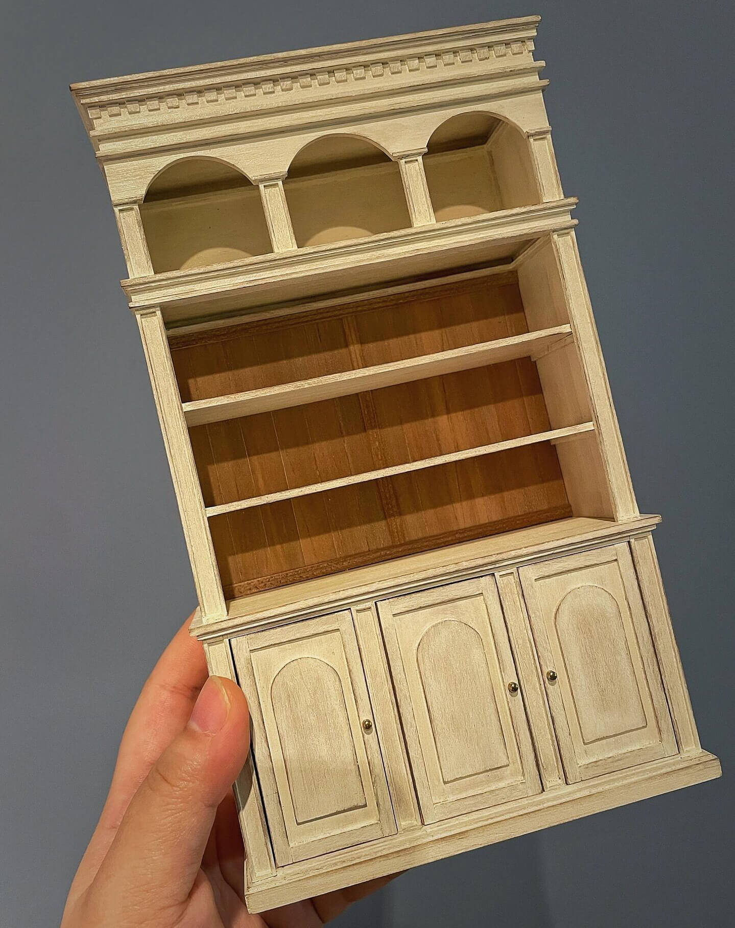 This striking miniature kitchen hutch bookcase dresser offers ample storage and display space, featuring black walnut wood or cherry wood and contrasting old paint. Color/ Finish: Cherry wood or Dark walnut Style: Vintage Shabby Chic Material: Black Walnut wood or Cherry wood