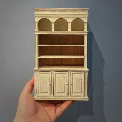 This striking miniature kitchen hutch bookcase dresser offers ample storage and display space, featuring black walnut wood or cherry wood and contrasting old paint. Color/ Finish: Cherry wood or Dark walnut Style: Vintage Shabby Chic Material: Black Walnut wood or Cherry wood