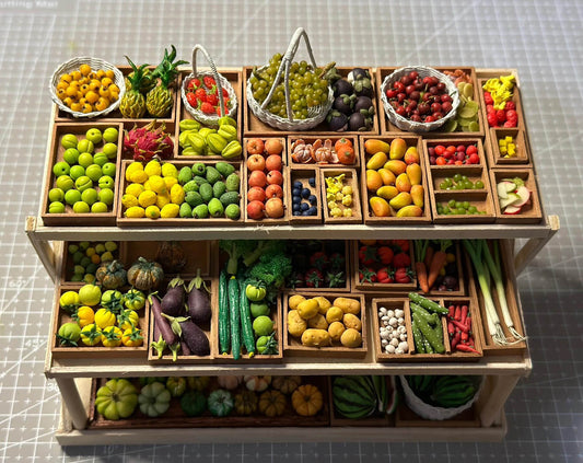 This unique miniature fruit stand is meticulously handcrafted from wood, showcasing exquisite craftsmanship. The stand comes fully stocked with a vibrant selection of fruits and vegetables, each delicately sculpted and hand-painted from clay to achieve stunning realism. Perfect for dollhouse enthusiasts, collectors, or as a special gift, this charming set combines natural wooden textures with colorful, lifelike clay fruits and vegetables to create a captivating display.