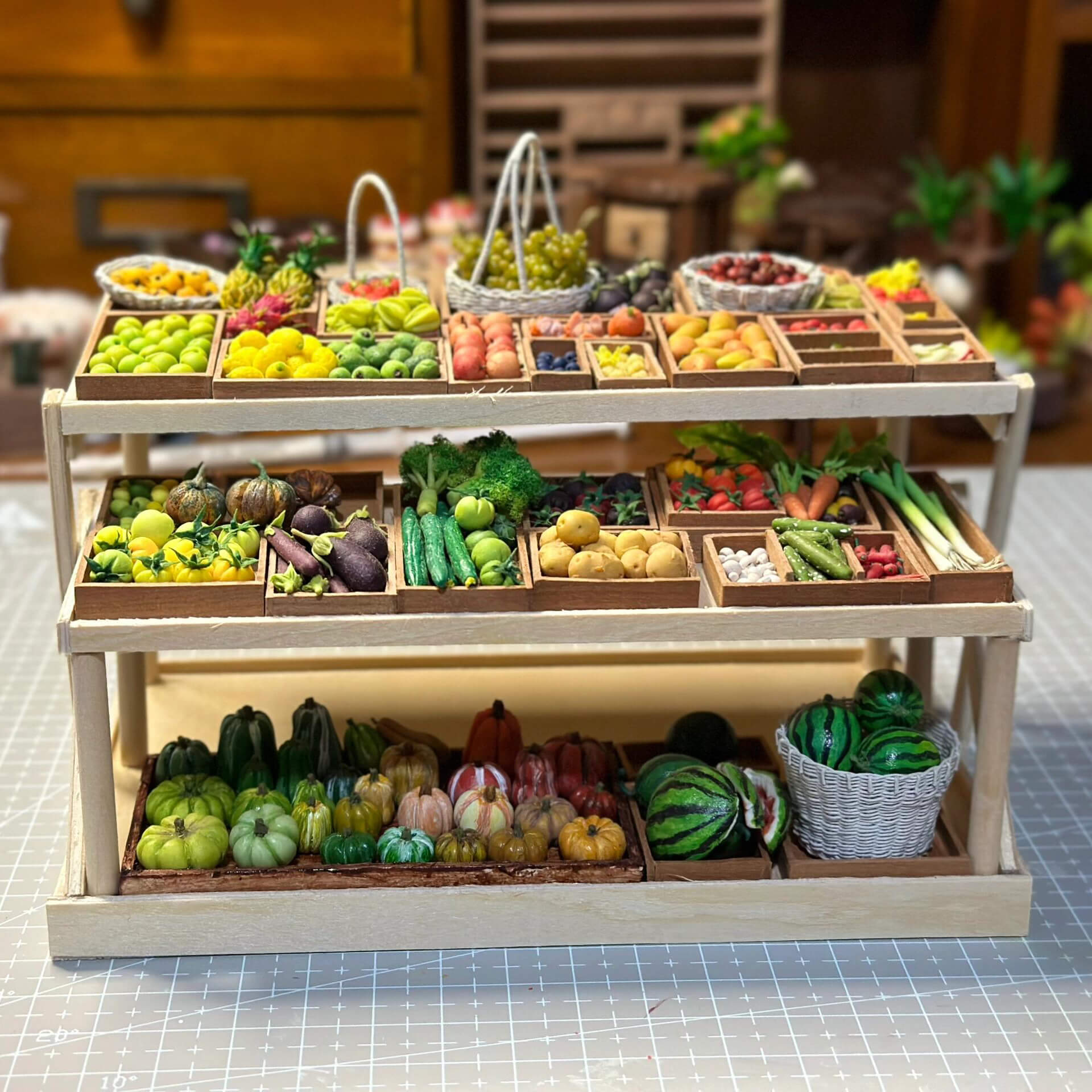 This unique miniature fruit stand is meticulously handcrafted from wood, showcasing exquisite craftsmanship. The stand comes fully stocked with a vibrant selection of fruits and vegetables, each delicately sculpted and hand-painted from clay to achieve stunning realism. Perfect for dollhouse enthusiasts, collectors, or as a special gift, this charming set combines natural wooden textures with colorful, lifelike clay fruits and vegetables to create a captivating display.