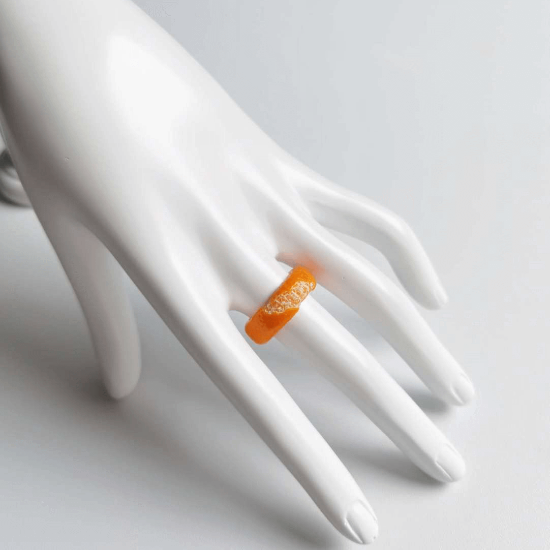 Cute realistic tangerine half-peeled ring are made with sterling silver or gold plated and polymer clay and then finished with a gloss varnish. The ring are made from high-quality materials and are durable, but should not be put in aggressive environments like excessive moisture, chemicals or perfume.