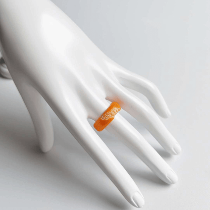 Cute realistic tangerine half-peeled ring are made with sterling silver or gold plated and polymer clay and then finished with a gloss varnish. The ring are made from high-quality materials and are durable, but should not be put in aggressive environments like excessive moisture, chemicals or perfume.