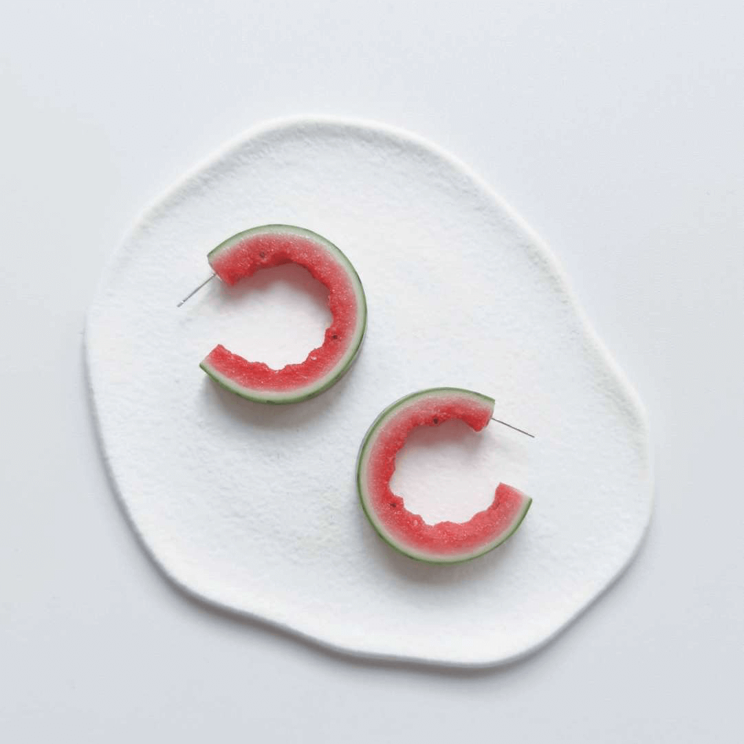 This listing is for 1 pair of C shaped watermelon stud earrings. Cute realistic watermelon stud earrings with sterling silver studs. The watermelon are made with polymer clay and then finished with a gloss varnish. The earrings are made from high-quality materials and are durable, but should not be put in aggressive environments like excessive moisture, chemicals or perfume.