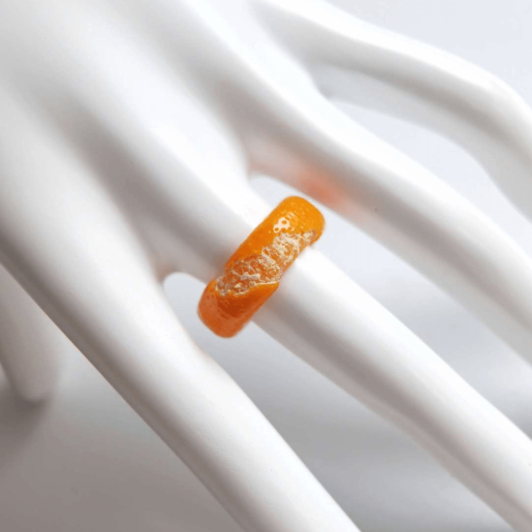 Cute realistic tangerine half-peeled ring are made with sterling silver or gold plated and polymer clay and then finished with a gloss varnish. The ring are made from high-quality materials and are durable, but should not be put in aggressive environments like excessive moisture, chemicals or perfume.