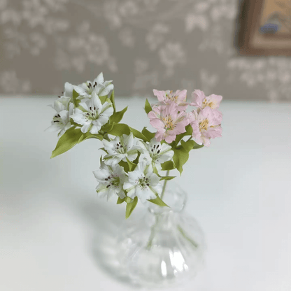 Alstroemeria, also commonly called the Peruvian Lily of the Incas, is the flower of happiness.  Scale: 1:6; 1:12  Material: Handmade from Clay  Size: 4 flowers + 1 bud  Color: White; Pink; Yellow