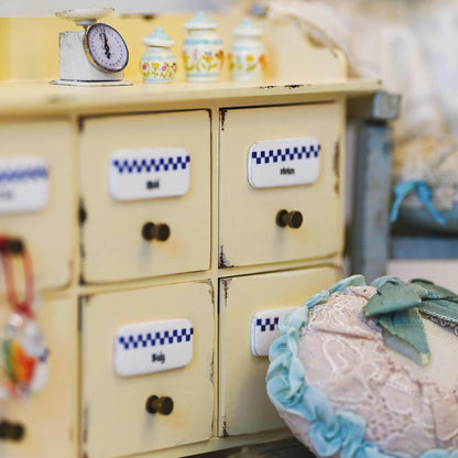 A versatile piece that could be used in any dollhouse, as a spice cupboard in the dollhouse kitchen or as a crafters storage, in bedroom, hall. Default Color/ Finish: Yellow Styles: Vintage Material: Solid Wood Type: Spice Cabinet Scale: 1/6 (20.2×7.3×15.3cm / 7.95×2.87×6.02in)