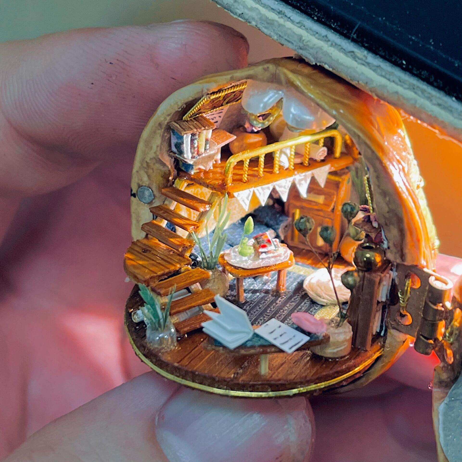 This Attic View Tiny House is entirely handmade; the items inside and the windows can all be opened and closed.