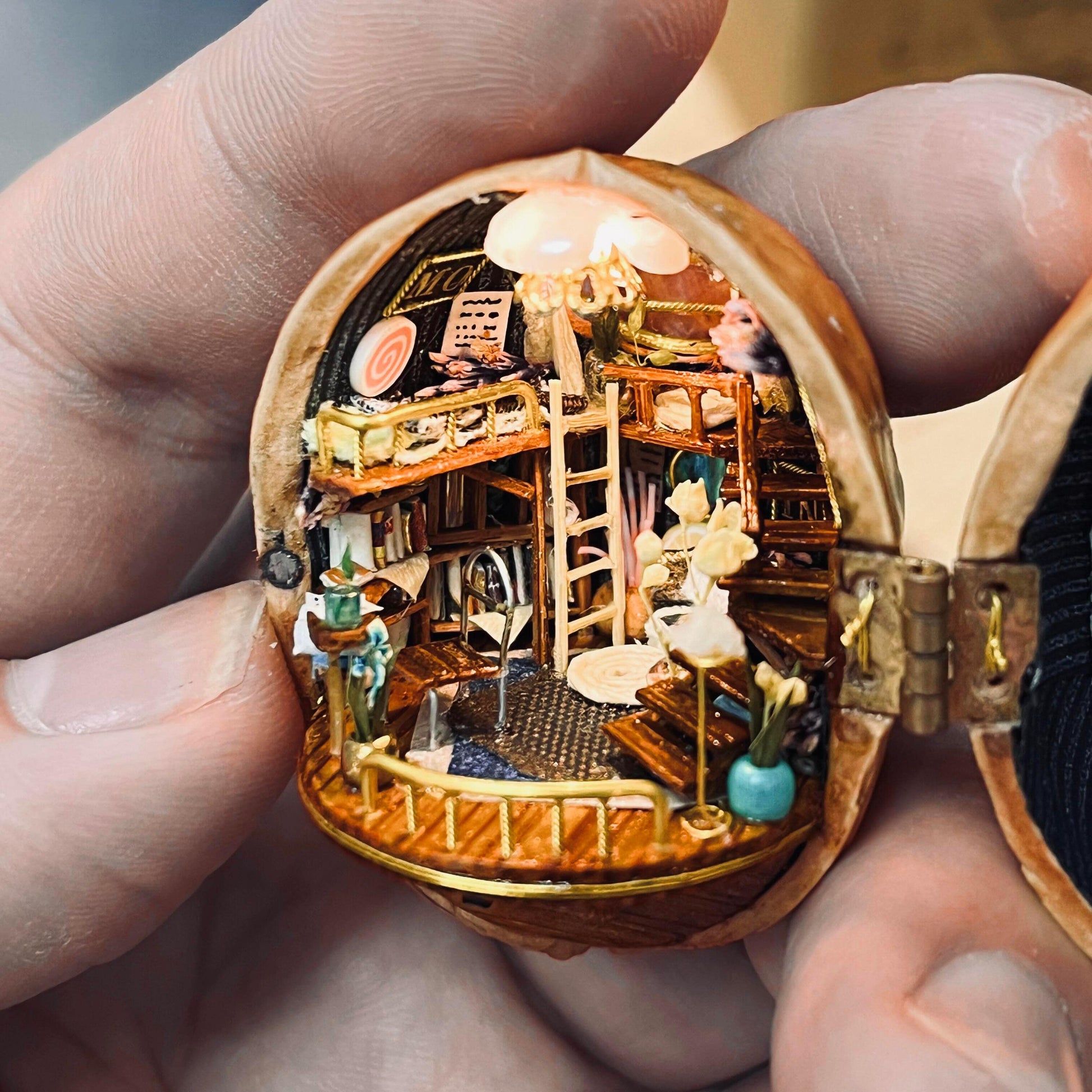 This Melody Magic House is entirely handmade; the items inside and the windows can all be opened and closed.