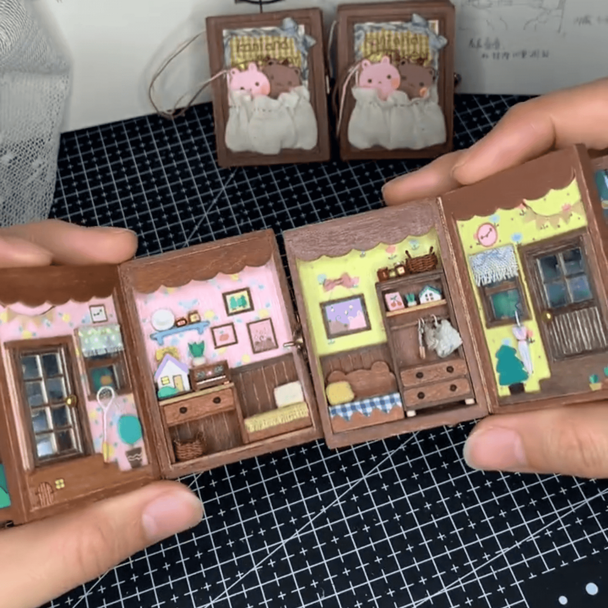 This flip book diorama showcases a beautifully crafted miniature scene featuring BB Bear's cozy home, presented in a flip book-style diorama. As the pages turn, the viewer is transported into a tiny, charming world where BB Bear lives. The intricate details of the miniature house, furnishings, and surroundings create a warm, inviting atmosphere.