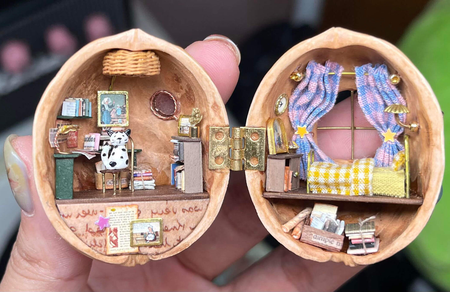 It’s filled with incredibly tiny, miniature details, recreating a cozy bedroom and a spacious, tidy study. With the lights off, there’s still a little cat keeping me company. So lovely!