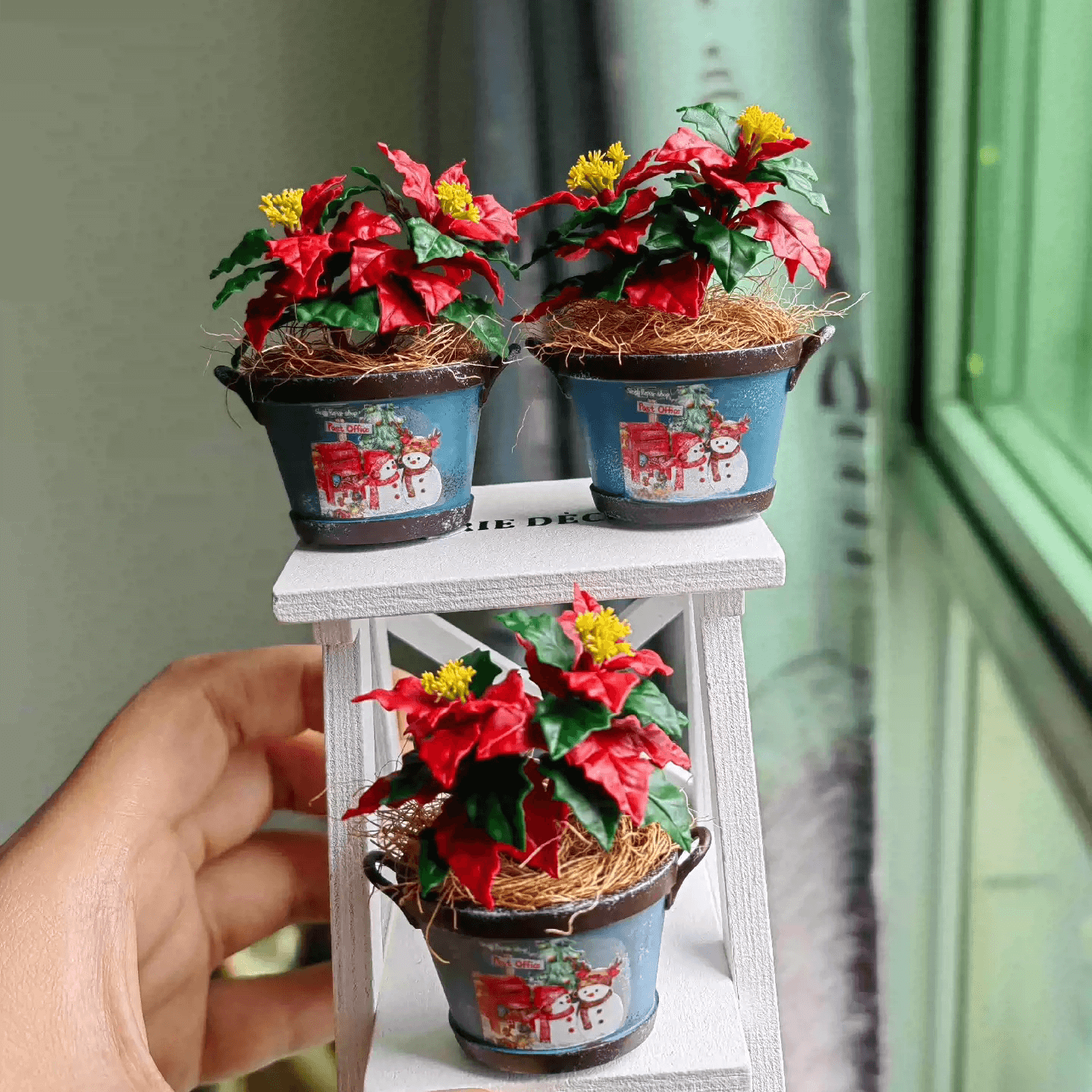 Poinsettia (Euphorbia pulcherrima) is a classic holiday plant, known for its festive red bracts set against green leaves.  This miniature Christmas Flower Euphorbia pulcherrima (Poinsettia)  ornaments will look stunning on a table setting or dollhouse.  Material: Handmade from Clay