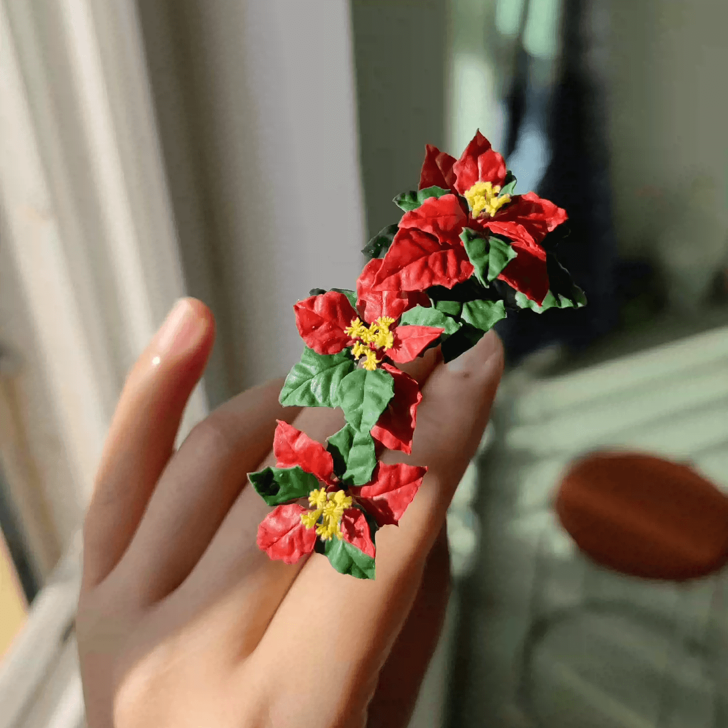 Poinsettia (Euphorbia pulcherrima) is a classic holiday plant, known for its festive red bracts set against green leaves.  This miniature Christmas Flower Euphorbia pulcherrima (Poinsettia)  ornaments will look stunning on a table setting or dollhouse.  Material: Handmade from Clay