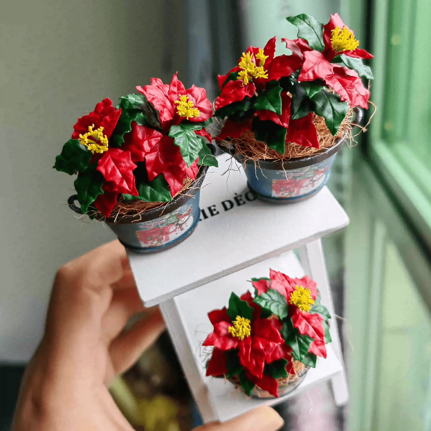 Poinsettia (Euphorbia pulcherrima) is a classic holiday plant, known for its festive red bracts set against green leaves.  This miniature Christmas Flower Euphorbia pulcherrima (Poinsettia)  ornaments will look stunning on a table setting or dollhouse.  Material: Handmade from Clay