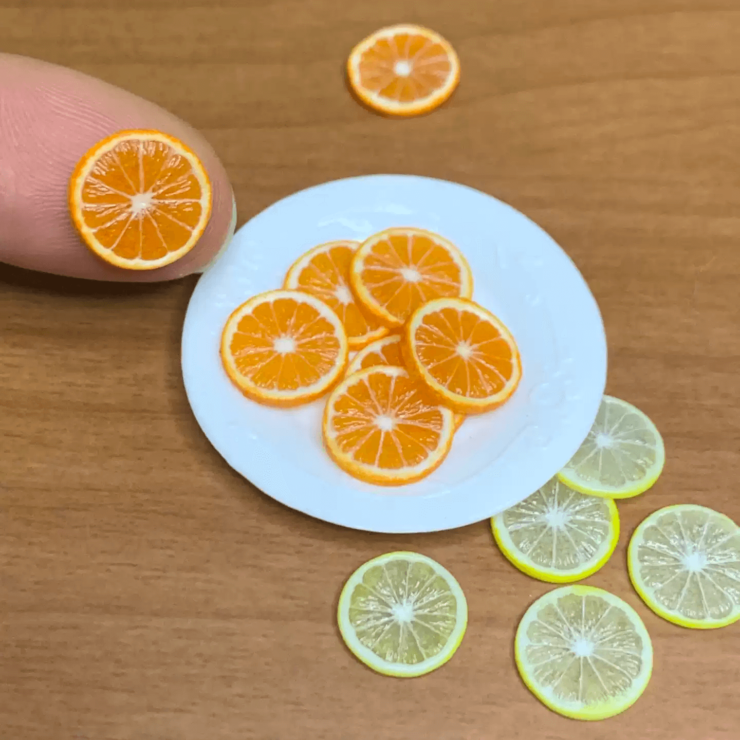 This miniature fruit Slice of Orange would be a wonderful addition to any doll's house kitchen or dining room table. Miniature fruits for dollhouse. Miniature Slice of Orange handmade from clay. Miniature fruits in 1/6 and 1/8 scale can be used in doll kitchen, doll grocery store, doll food, collection, diorama decoration.