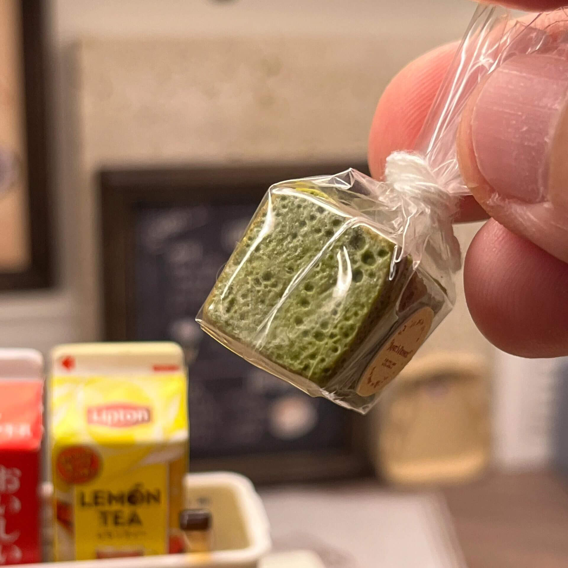 The plain bread has a warm, golden-yellow color, while the matcha bread is a delicate green, capturing the authentic look of real bakery items.