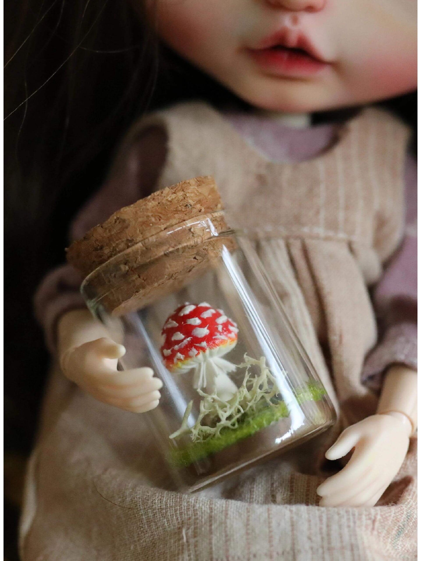 Bring a touch of magic to your space with our adorable Miniature Mushroom nestled in a charming glass jar! This enchanting piece creating a serene atmosphere perfect for any dollhouse room or garden.