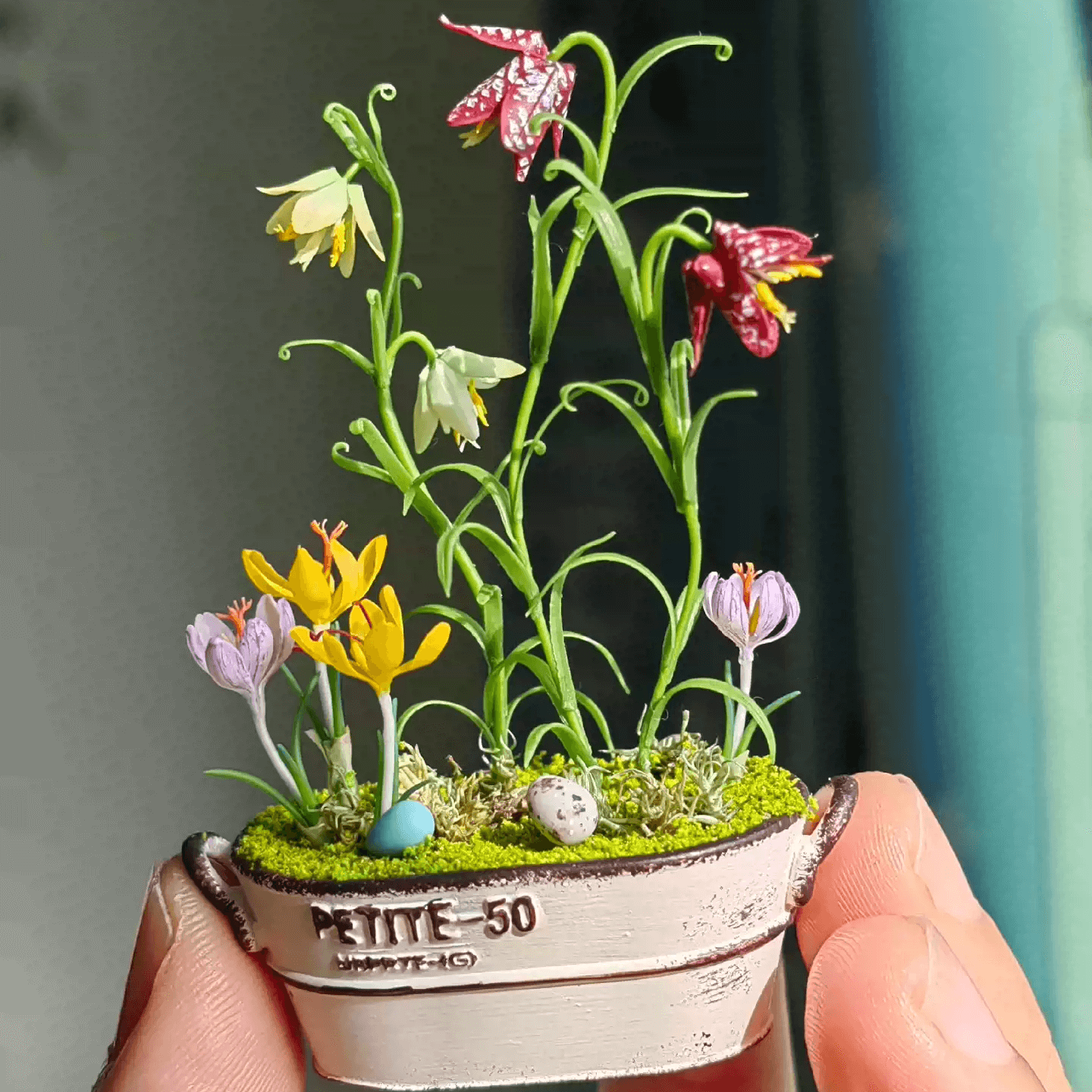 Fritillarias flower from mid to late spring and are perennial.  Crocus is a wonderful bulb to plant underneath trees or in a landscape bed.  Fritillaria thunbergii, Fritillaria meleagris, Crocus sativus and bird's eggs in clay planter.  Material: Handmade from Clay