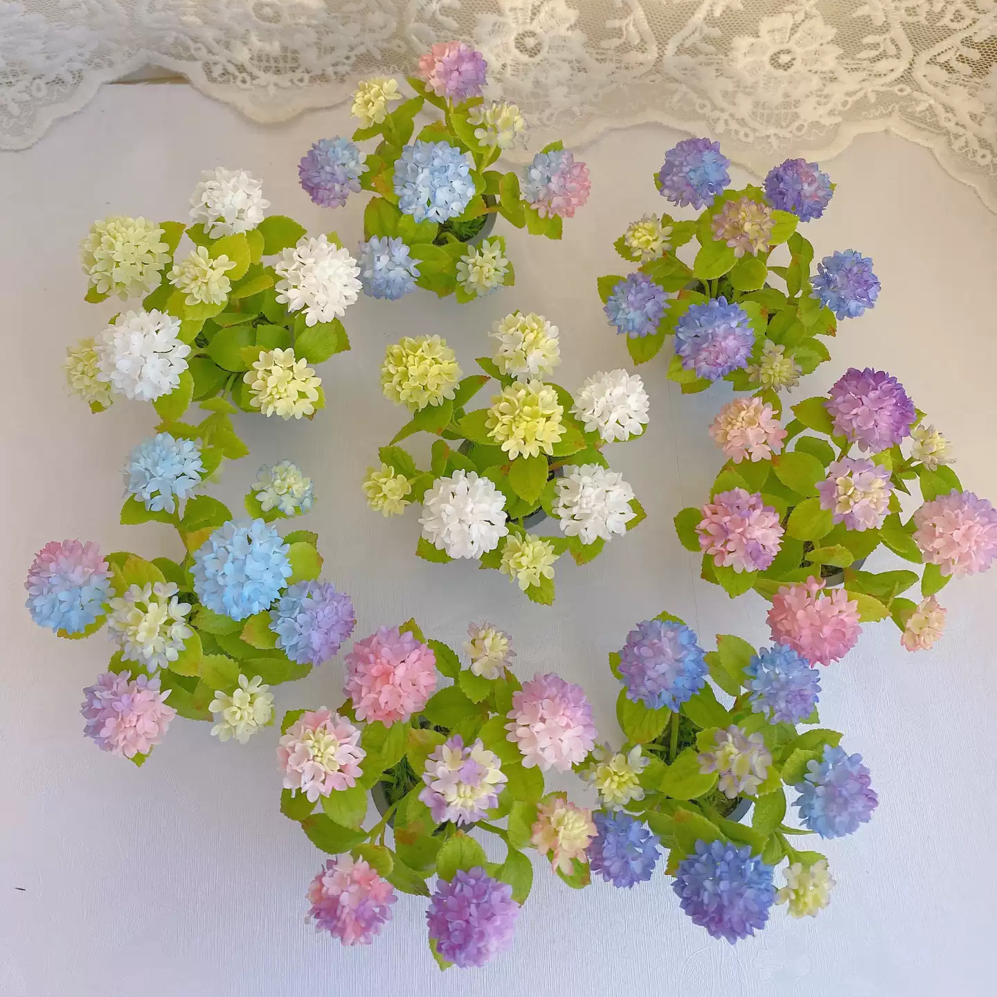 Hydrangeas are deciduous shrubs with flowers in terminal, round or umbrella-shaped clusters in colors of white, pink, or blue, or even purple.  Dollhouse Garden Plants Handmade from Clay.