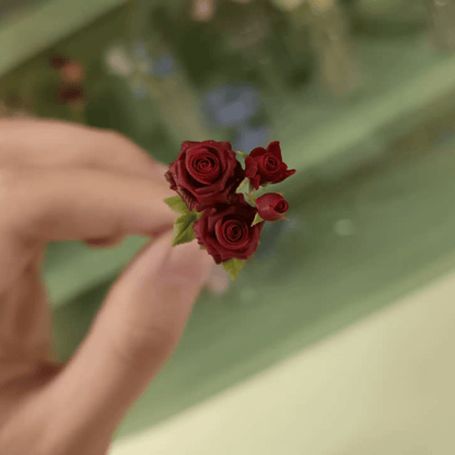 The red rose is a classic symbol of love. Add these blooms to your miniature garden to give them a pop of bright romantic red. Miniature for dolls, dollhouses, roomboxes. Suitable for Blythe, Barbie, Paola,and other dolls with a height of 25-40cm (10-15.8 inches). Scale: 1:6; 1:12 Material: Handmade from Clay