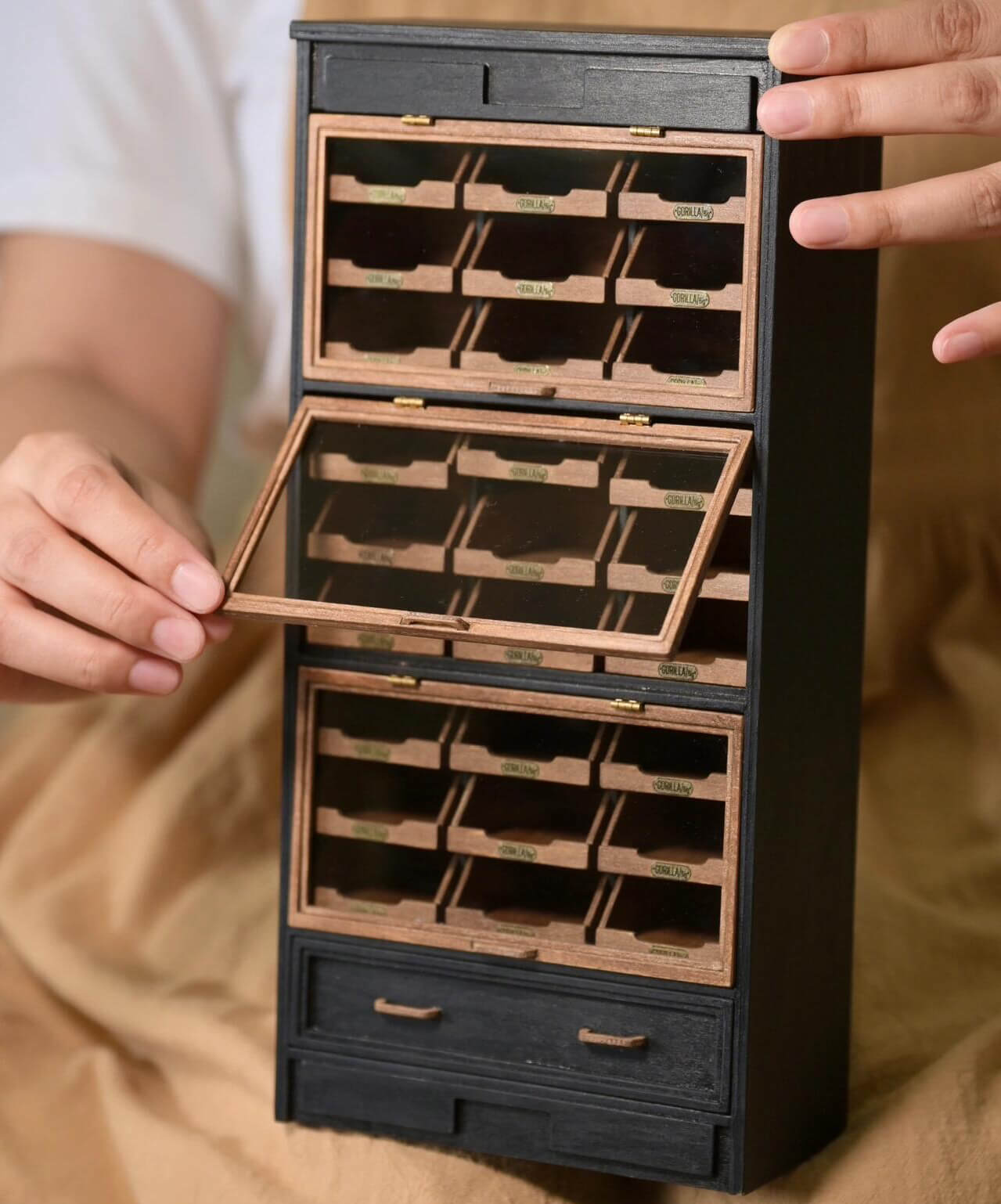 Our Haberdashery Drawer Unit provides a great place to store and display items. Featuring doors that lift up to reveal 27 internal drawers, this haberdashery unit has plenty of organised storage for all your belongings and that's not all!