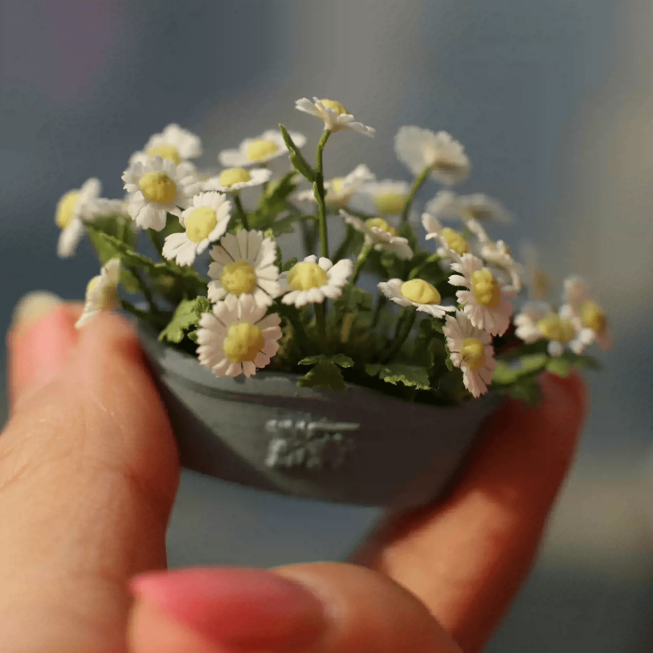 Bellis perennis is a very common European species of daisy, of the Asteraceae family, often considered the model type for the name "daisy".  Material: Handmade from Clay