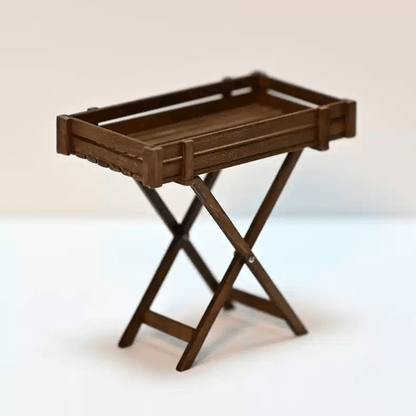 Add a touch of rustic charm to your dollhouse with this Miniature Folding Wooden Table Kit. Perfect for small spaces or as a decorative piece, this table features a detailed wooden construction with a folding design, allowing it to be compact and practical for any miniature setting. Whether you're using it as a plant stand, a side table, or a display piece, this table brings both functionality and style to your miniature world.