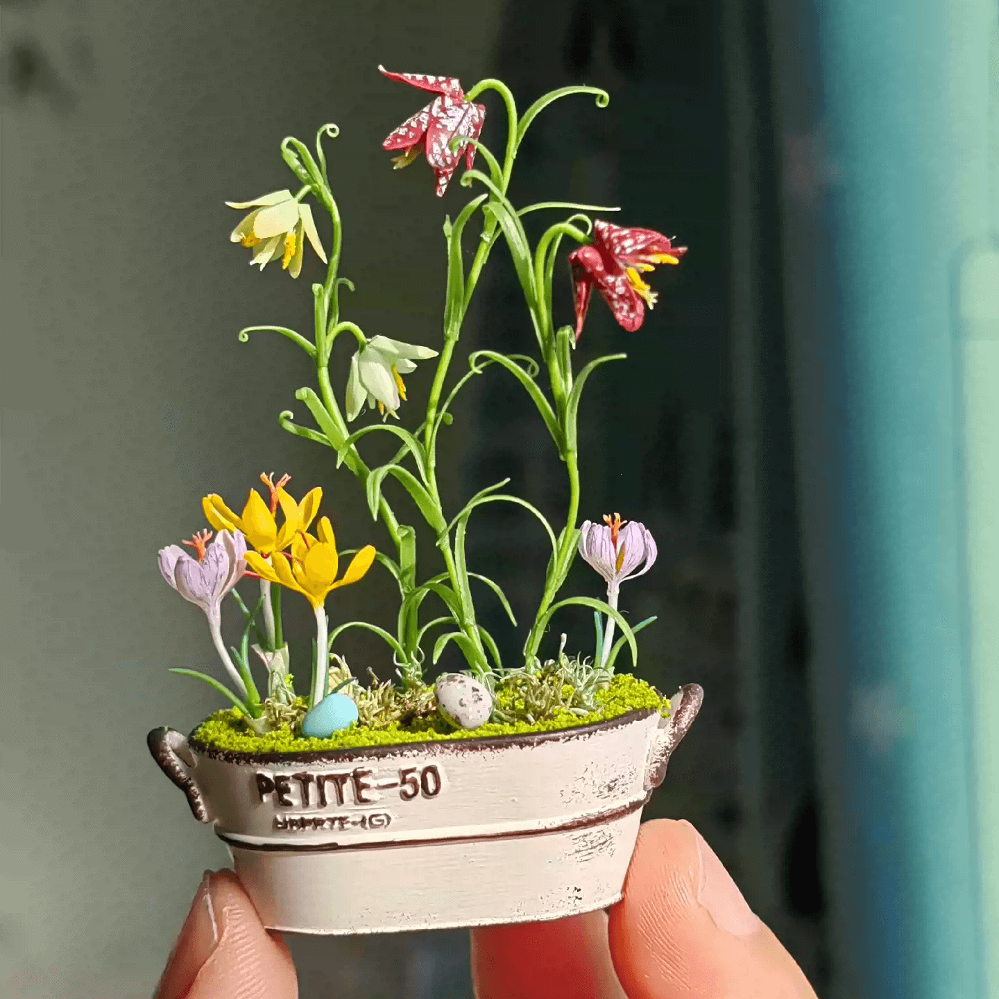 Fritillarias flower from mid to late spring and are perennial.  Crocus is a wonderful bulb to plant underneath trees or in a landscape bed.  Fritillaria thunbergii, Fritillaria meleagris, Crocus sativus and bird's eggs in clay planter.  Material: Handmade from Clay