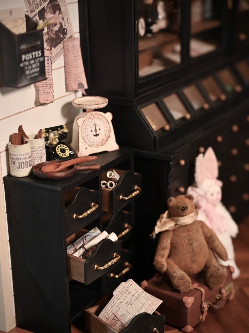 Keep your trinkets, documents, teas, dried herbs, jewellery or haberdashery organised in our dollhouse multifunctional hand painted chest. Made from wood, our chest features handy clips to keep the drawers in place when in use. Default Color/ Finish: Black and Brown Style: Shabby Chic Material: Wood