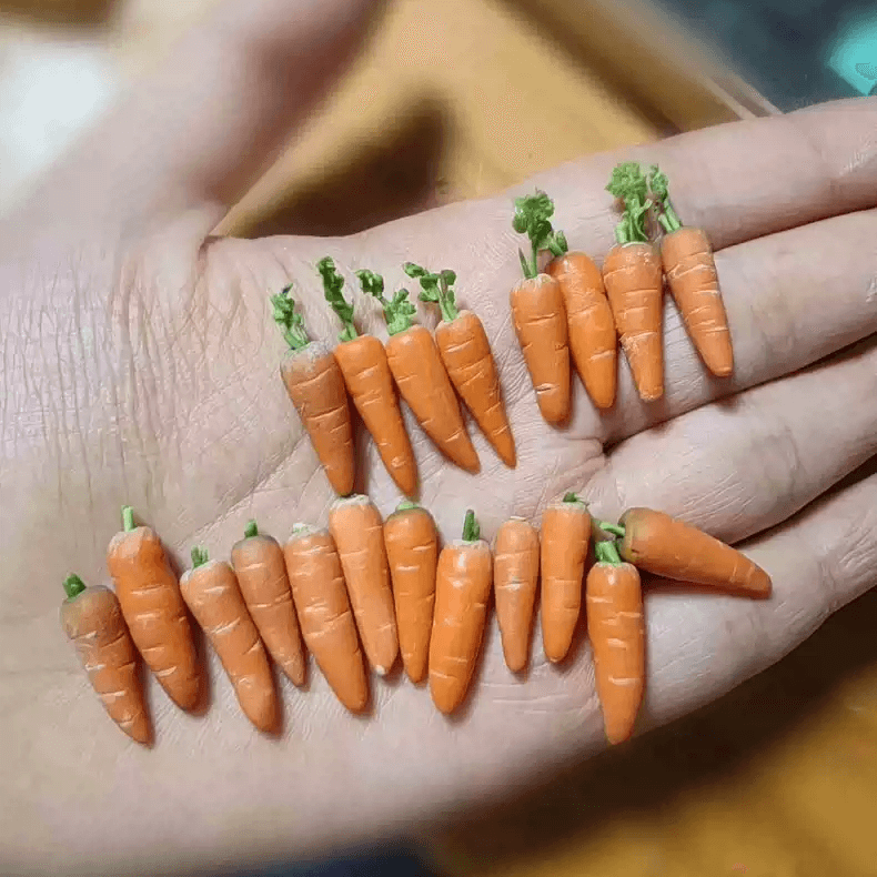 This miniature vegetable carrots would be a wonderful addition to any doll's house kitchen or dining room table. Material: Clay