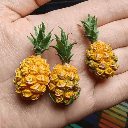 These miniature pineapple are made with attention to detail, ensuring durability and a lifelike appearance. The intricate details and vibrant colors make them stand out as realistic and attractive dollhouse food items. Material: Clay Size: 3cm / 1.18inch