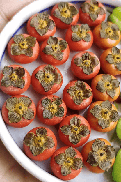 Miniature fruit persimmon for a dollhouse. Miniature fruit persimmon made of clay. Miniature fruit persimmon can be used in doll kitchen, doll grocery store, doll food, collection, diorama decoration.