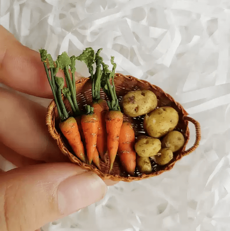 This miniature vegetable potato would be a wonderful addition to any doll's house kitchen or dining room table. Material: Clay