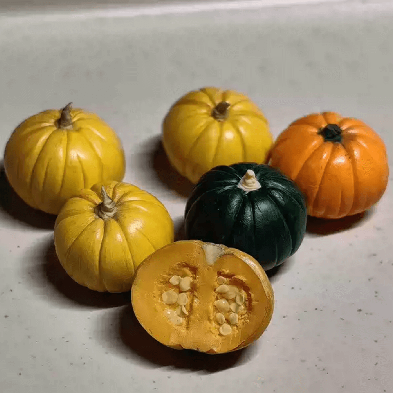 Each pumpkin is carefully handsculpted from clay, without using any molds, and shaded with acrylic paint and soft pastels for more details and depth.