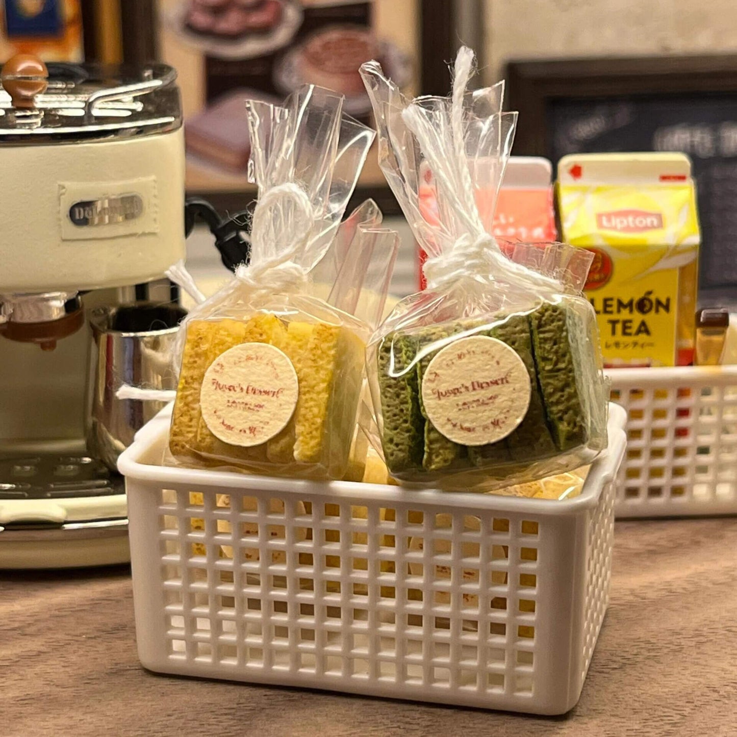 The plain bread has a warm, golden-yellow color, while the matcha bread is a delicate green, capturing the authentic look of real bakery items.