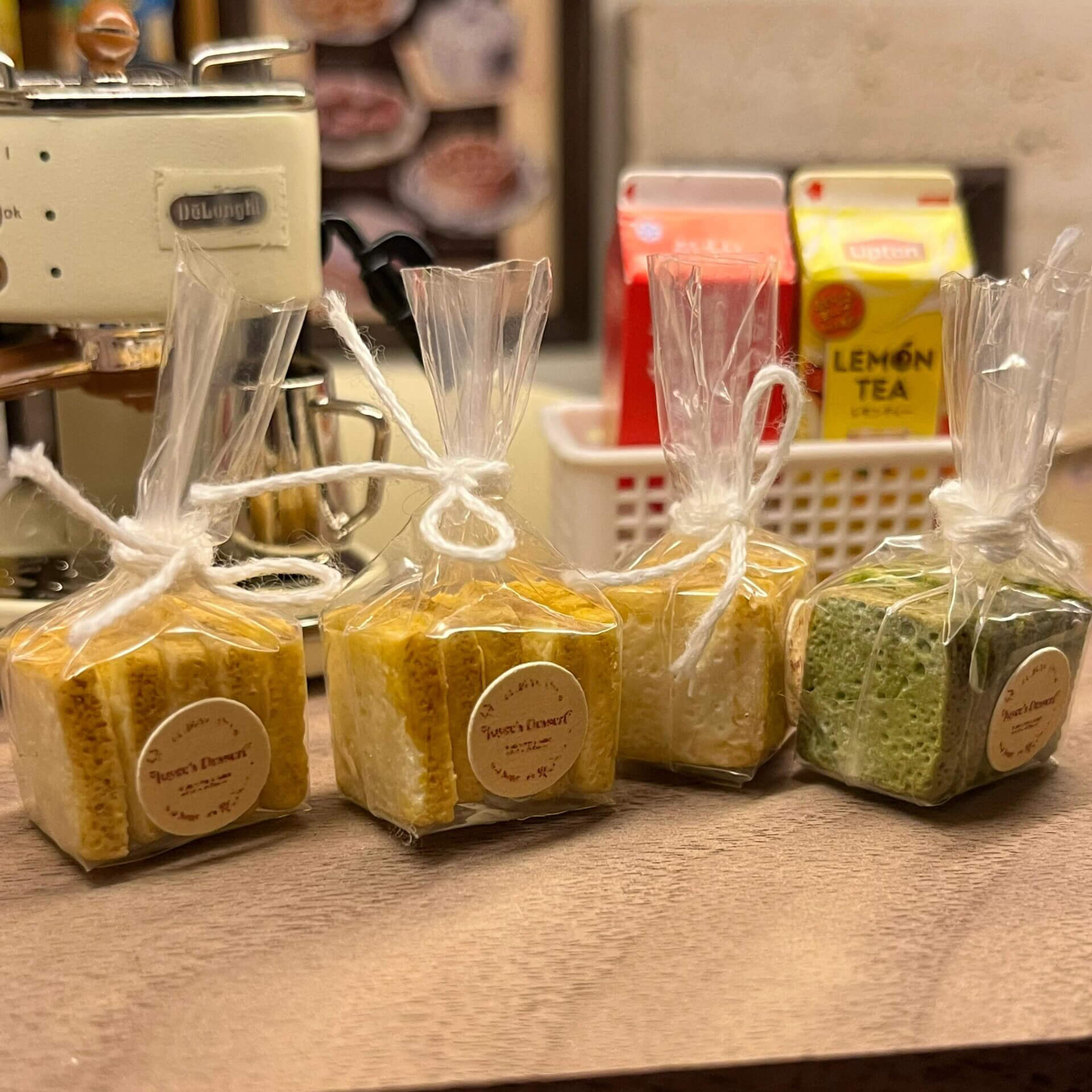 The plain bread has a warm, golden-yellow color, while the matcha bread is a delicate green, capturing the authentic look of real bakery items.